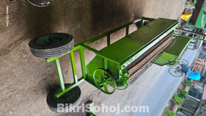 ধান মাড়াই করা মেশিন